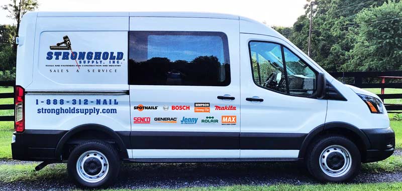 White van with blue lettering showing STronghold Supply logo and other logos of manufacturers.